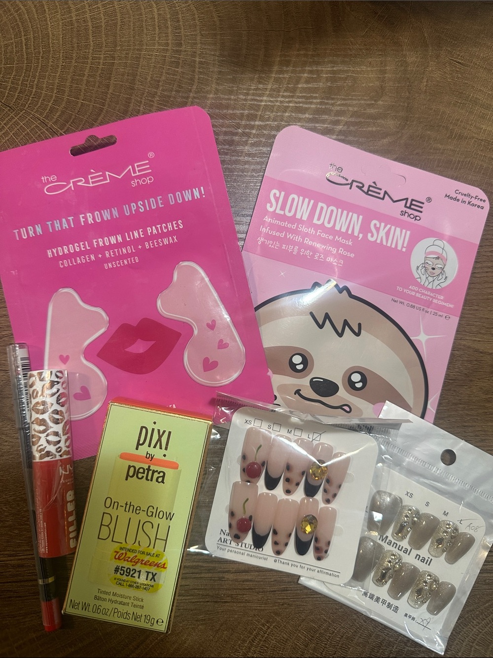 The Crème Shop Pink Hydrogel Frown Patches & Pink Animated Sheet Mask Duo